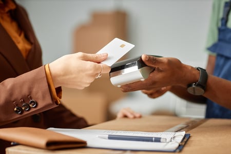 Using digital credits to pay merchant